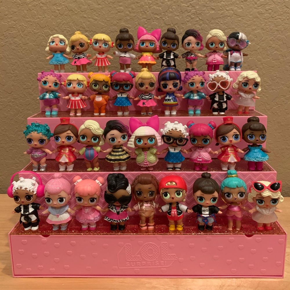 Lol Dolls and storage box for dolls